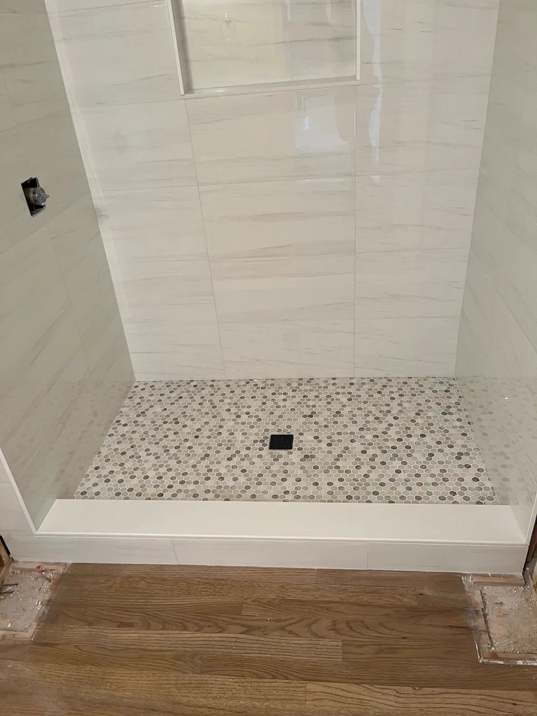 Finished shower with a mosaic pebble tile pan, master bathroom remodel, Metro Atlanta