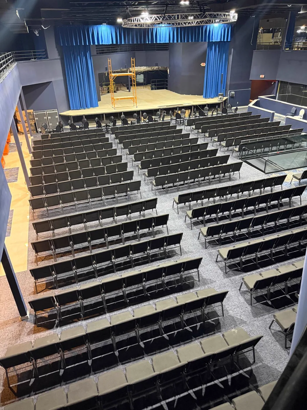 Finished auditorium with stage and seating, commercial venue renovation, Metro Atlanta